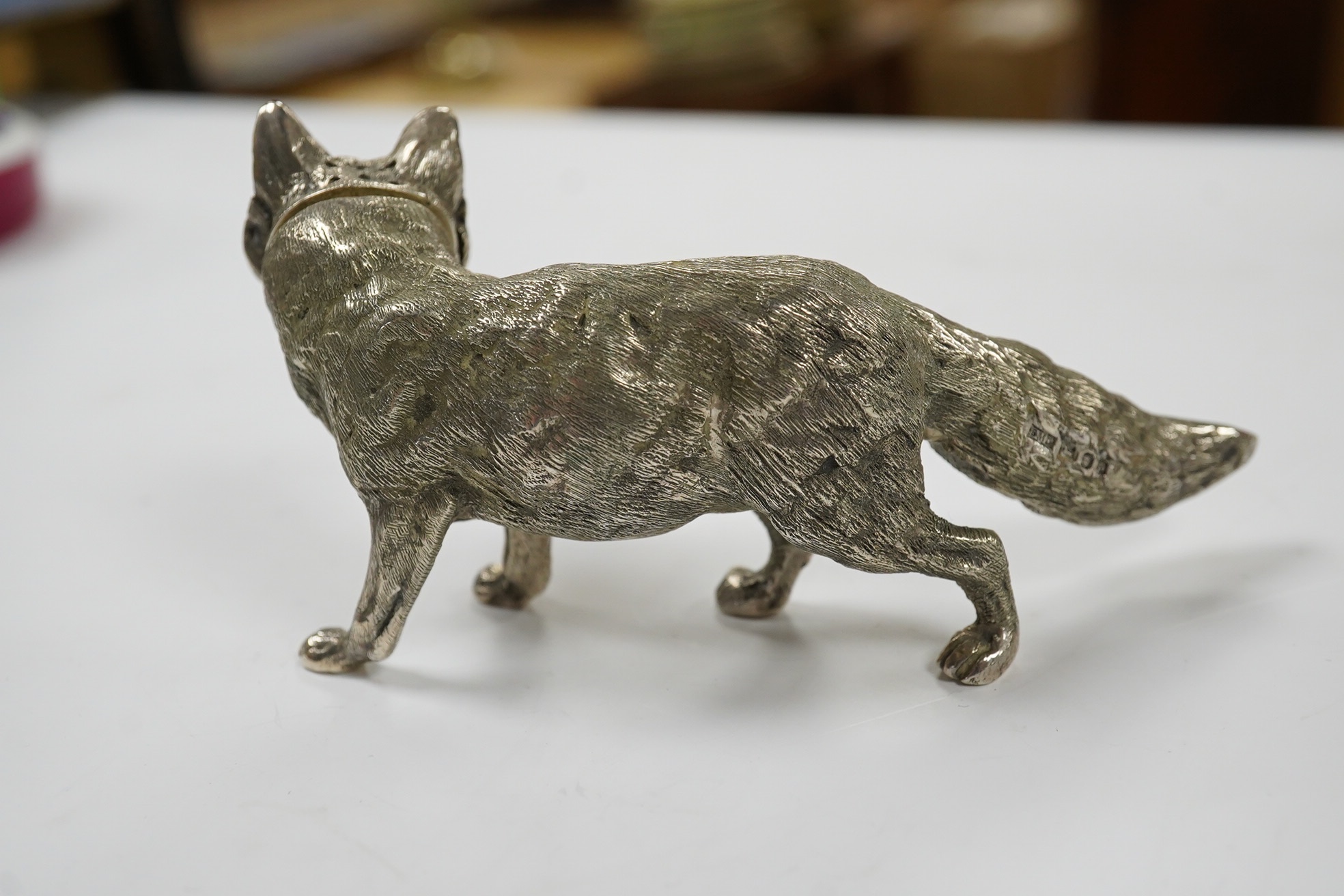 An Elizabeth II novelty silver condiment, modelled as a free standing fox, maker SMD Castings?, London, 1970, length 10.7cm, 4.3oz. Condition - fair to good